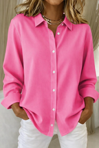 Blusa minimalista mujer corte holgado con botones frontales