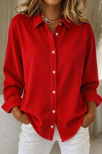 Blusa minimalista mujer corte holgado con botones frontales