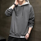 Sudadera con capucha bicolor bolsillo canguro diseño urbano casual