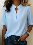 Blusa mujer cuello V manga corta holgada de color sólido