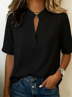 Blusa mujer cuello V manga corta holgada de color sólido