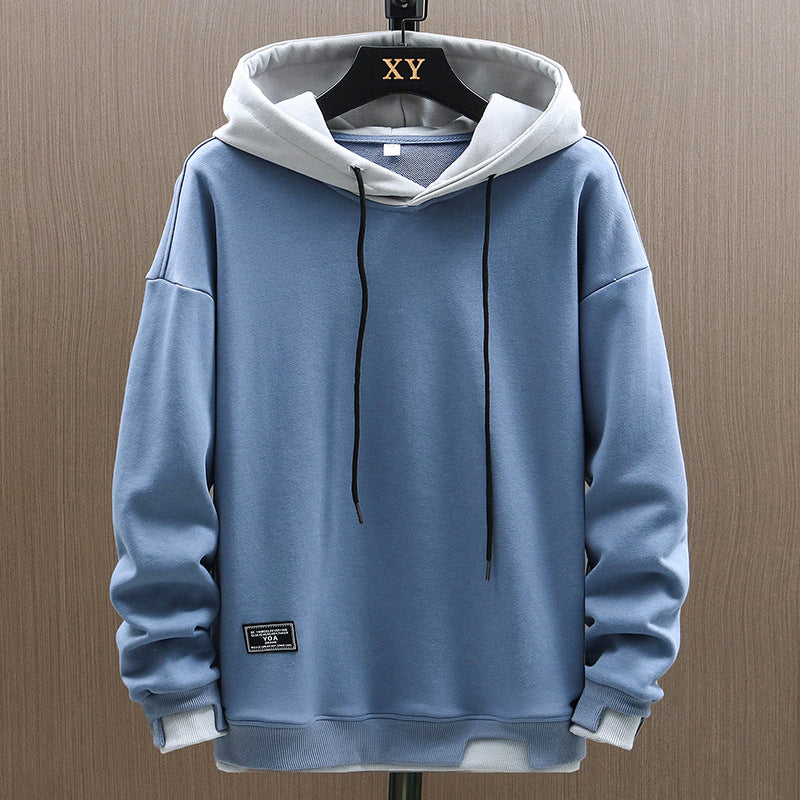 Sudadera con capucha bicolor bolsillo canguro diseño urbano casual