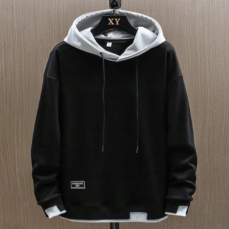 Sudadera con capucha bicolor bolsillo canguro diseño urbano casual