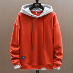 Sudadera con capucha bicolor bolsillo canguro diseño urbano casual